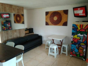 Apartamento aconchegante para a família relaxar.